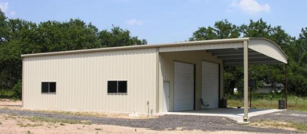 Texas metal building with lean/to roof on the side.