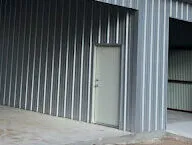 Turnkey metal building walk doors